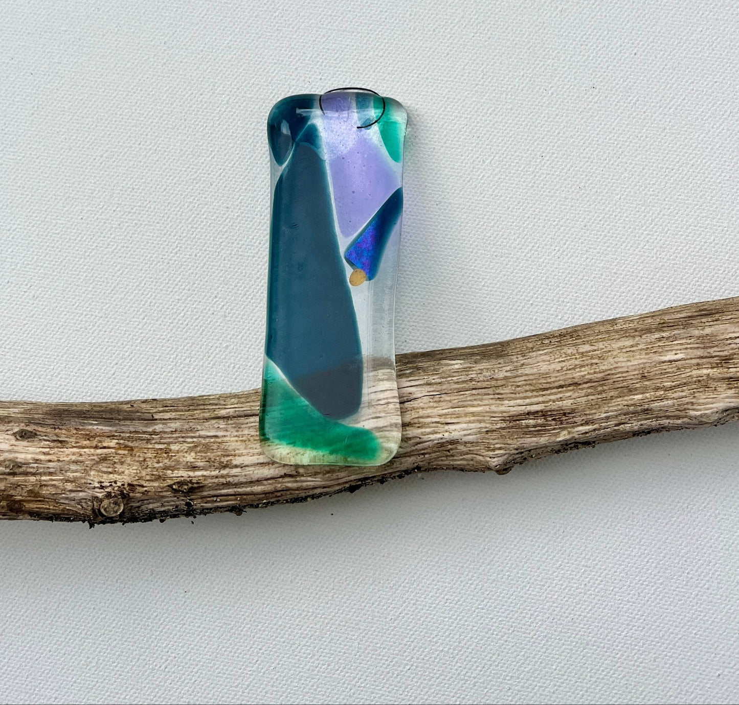 kiln glass nebula green and blue glass on white background